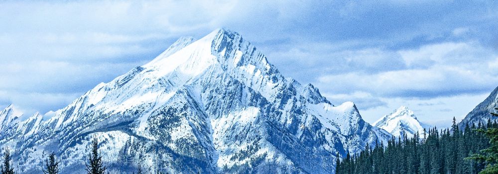 A blue scene of a mountain.