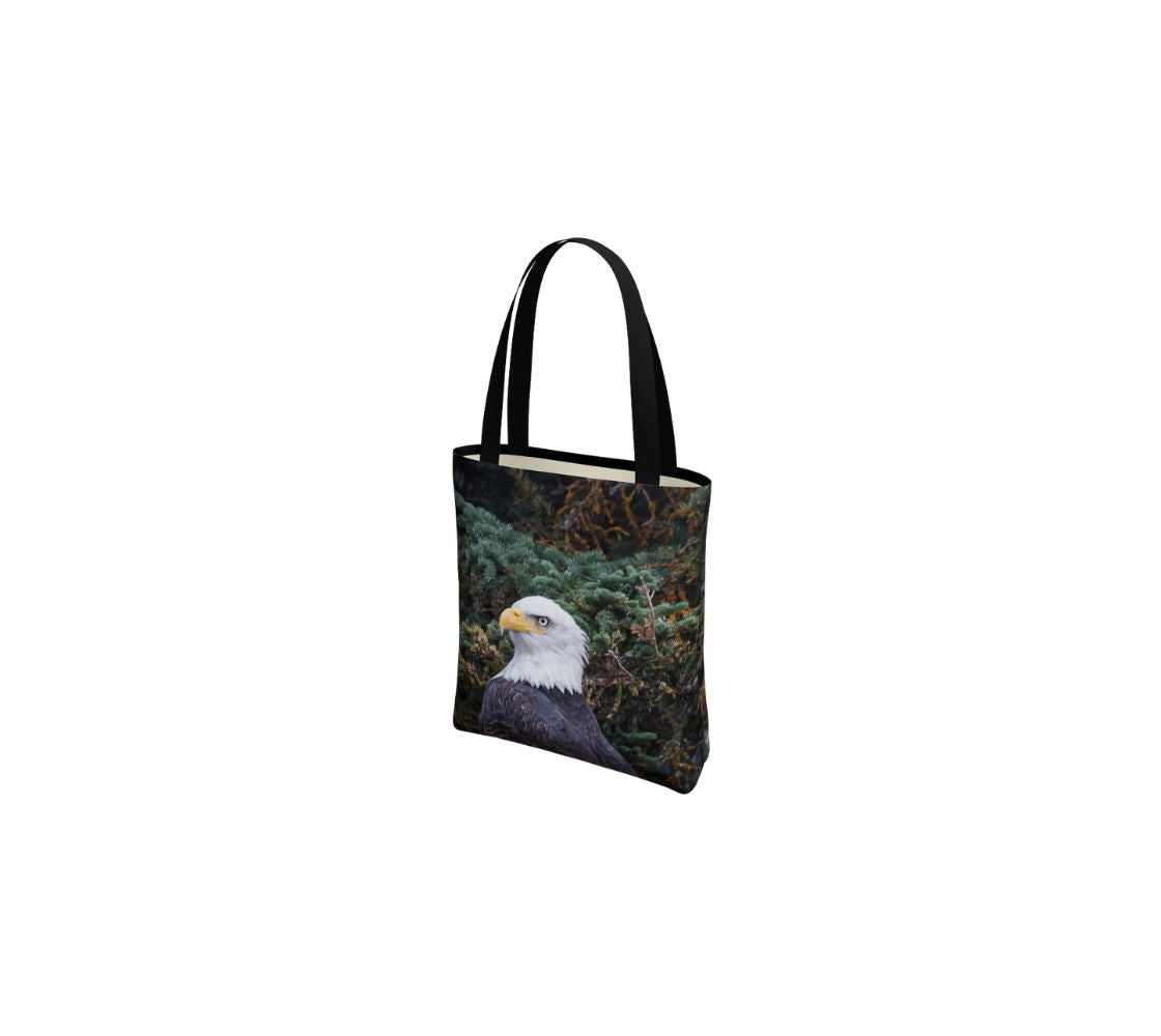 A bald eagle portrait medium reusable tote bag from our real wildlife photography.