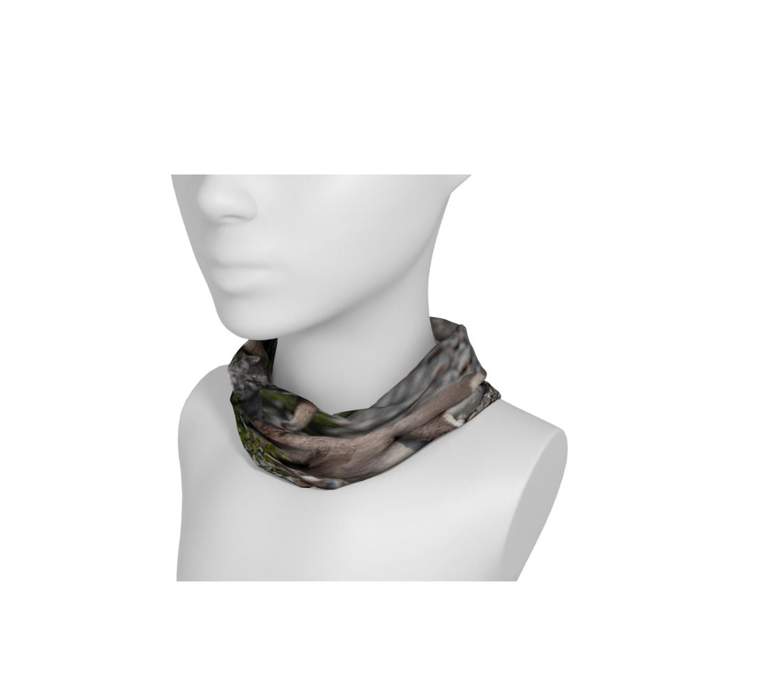 A bighorn ram head and neck buff from our real wildlife photography wrapped around a mannequin's neck.