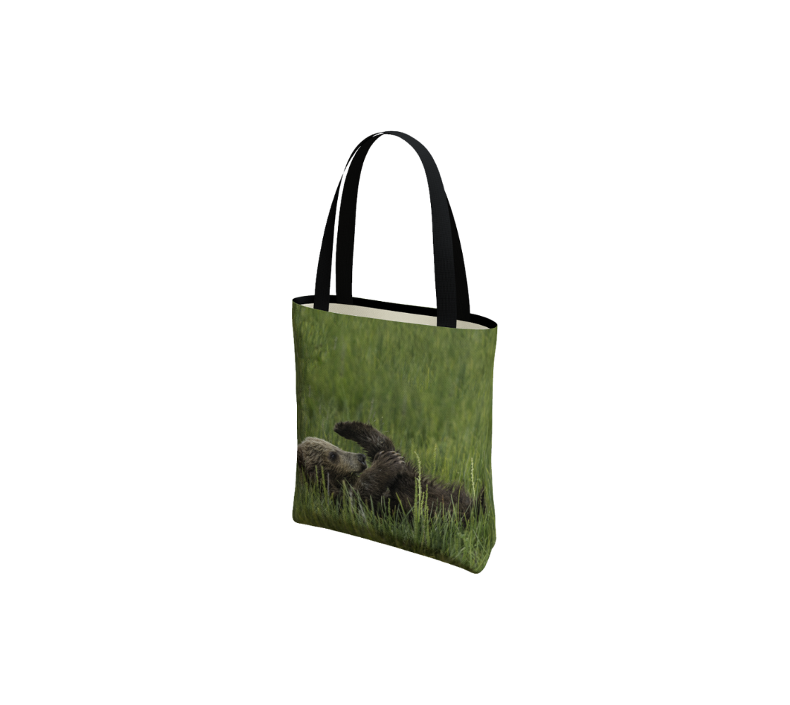 A brown bear cub medium tote bag from our real wildlife photography.