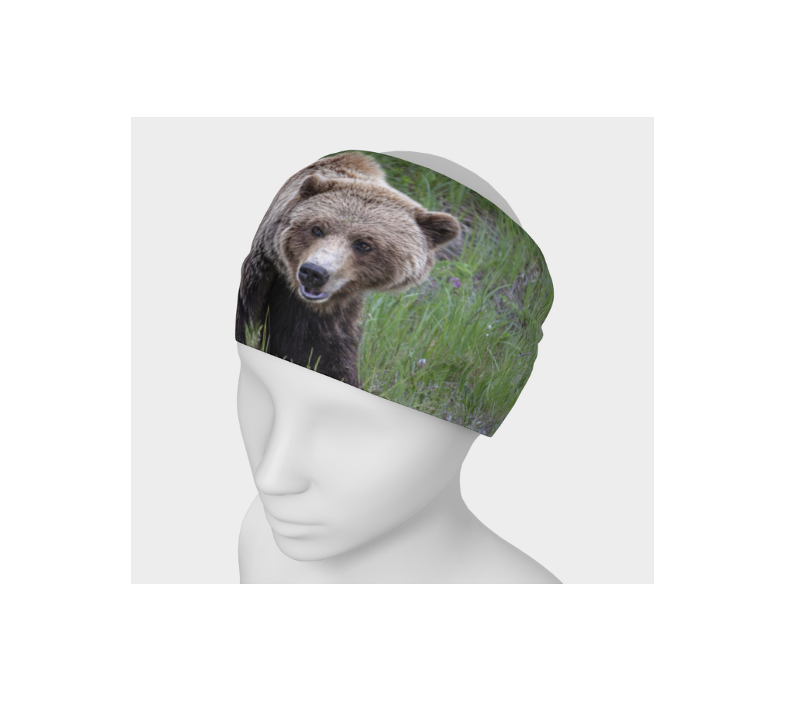 A grizzly bear head and neck buff from our real wildlife photography on a mannequin head as a head band.