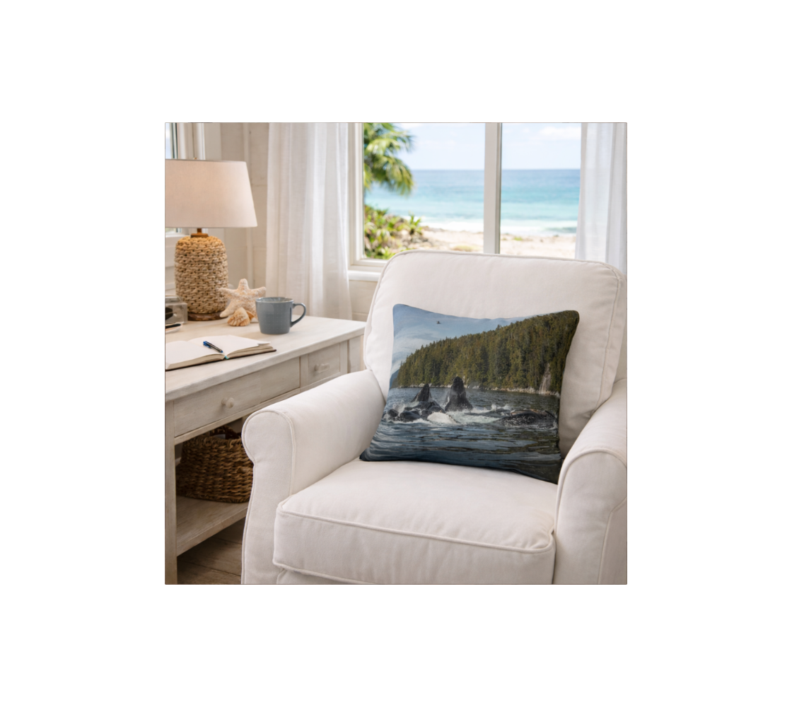 A cozy living room with a humpback whales decorative throw pillow cover from our wildlife photography on white armchair.