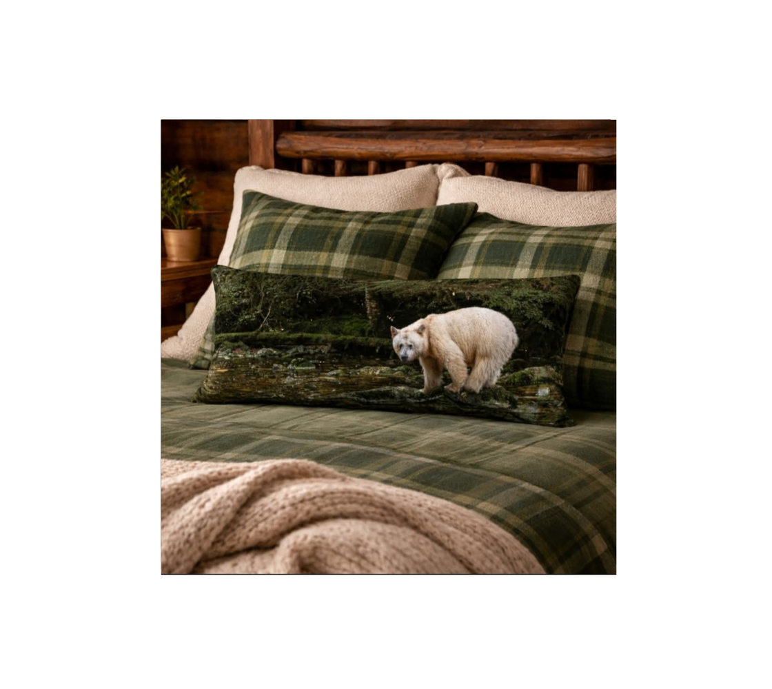 Green Plaid bedding set with a spirit bear design on a bed.