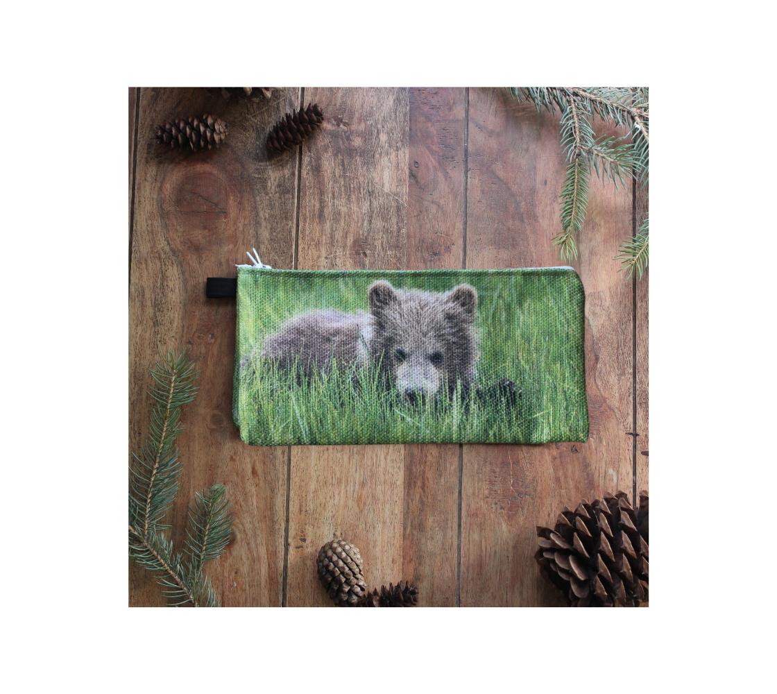 Durable double sided 9” x 4” canvas zippered pouch featuring real images of grizzly bear cubs .