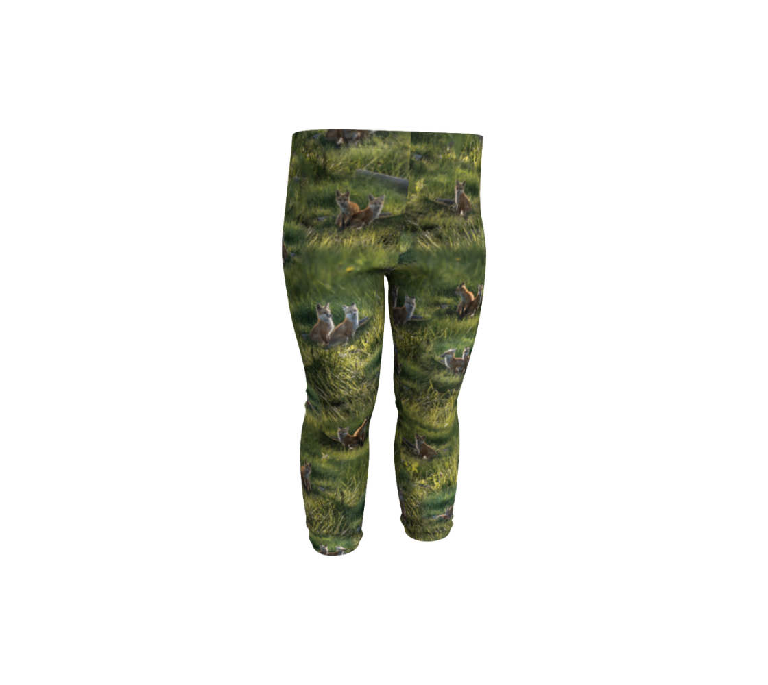 A front view of a pair of red fox kit baby leggings from our real wildlife photography.