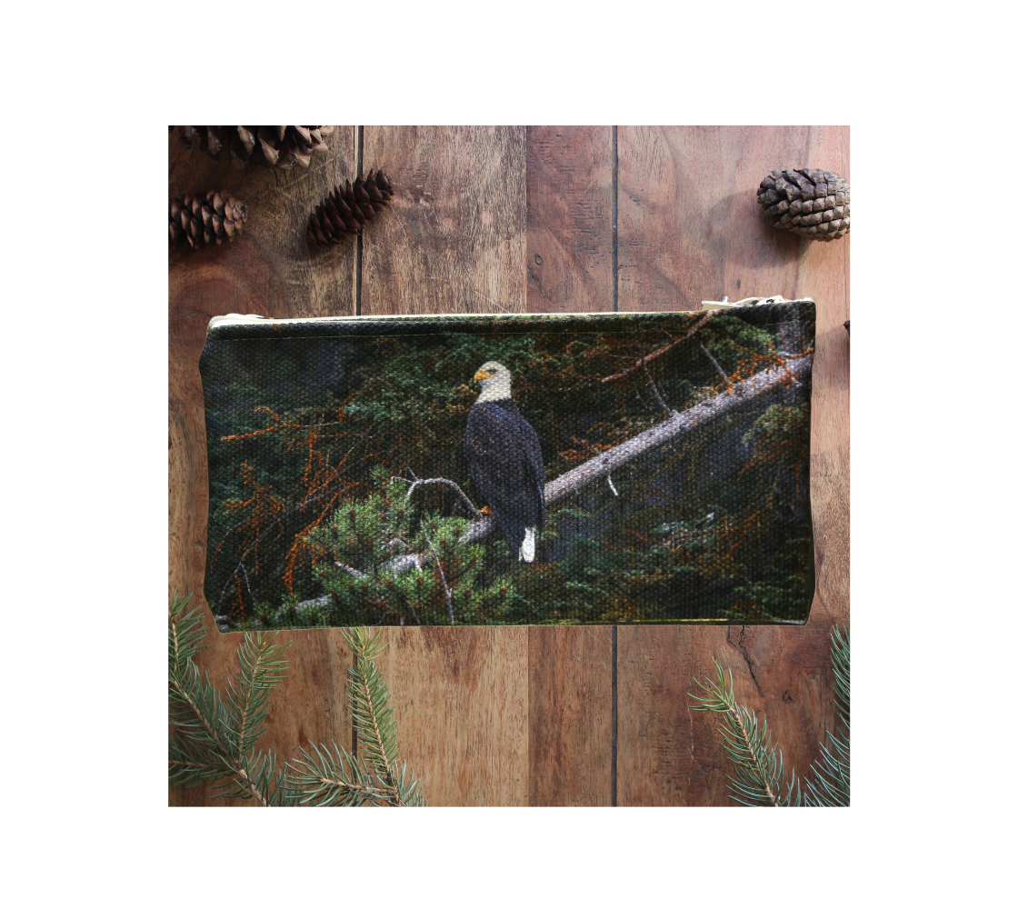 Durable double sided 9” x 4” canvas zippered pouch featuring real images of bald eagle.