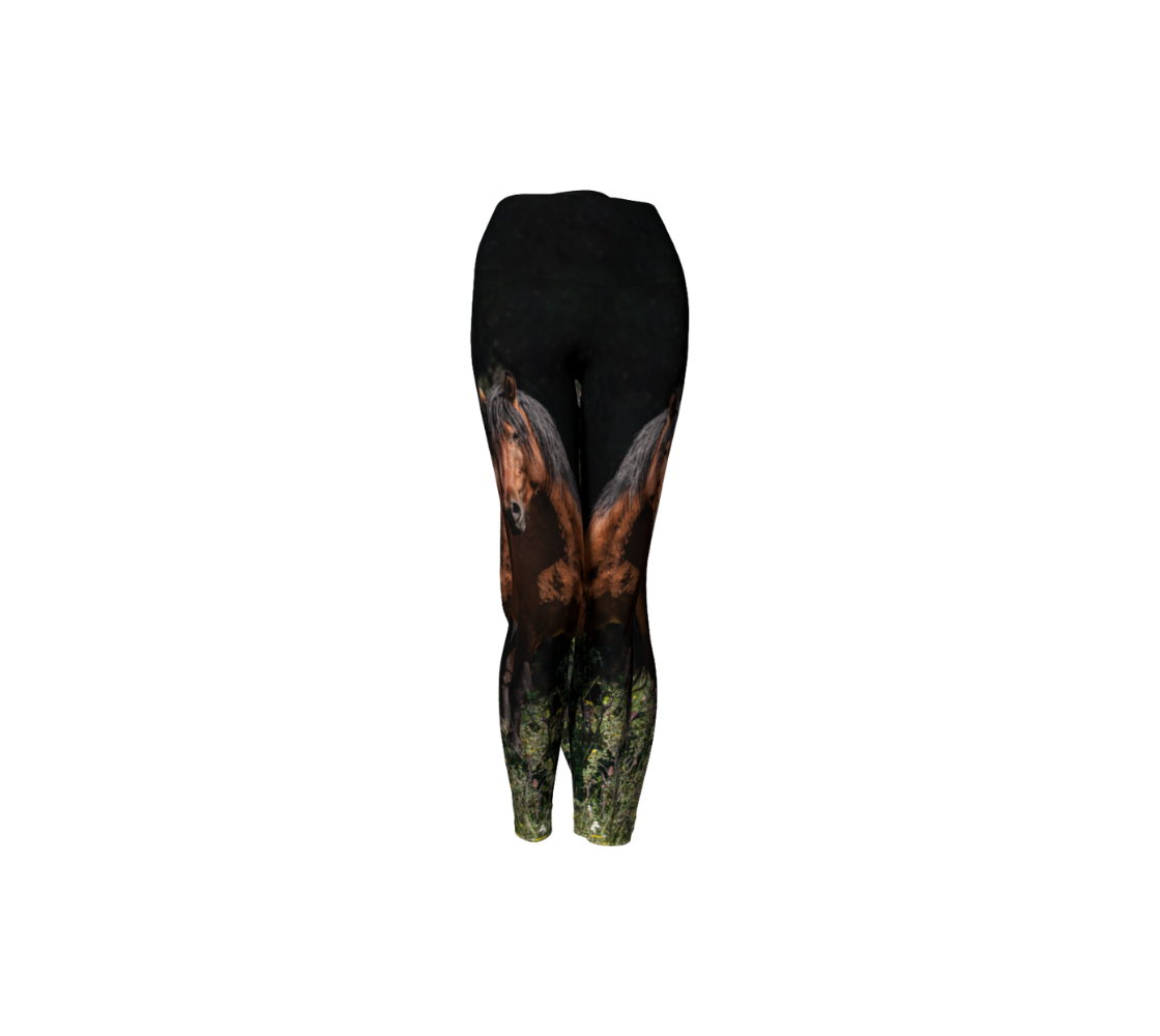 A front profile of yoga leggings with a photo of a wild stallion on the side of each leg, with a 4.5 inch high waist band. The background is dark green/black at the top with green grass at the bottom, with an image of a chestnut brown wild horse with a black mane and tail.