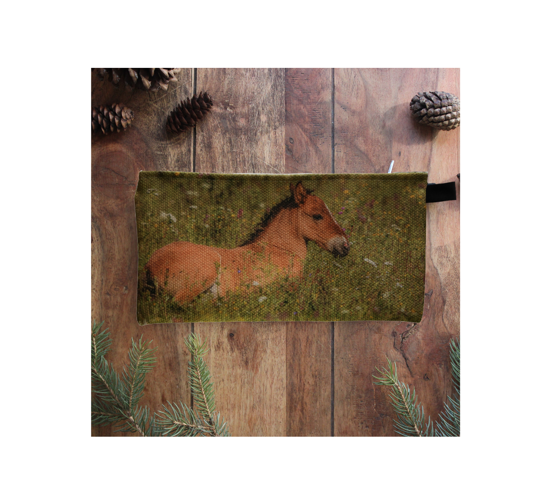 Durable double sided 9” x 4” canvas zippered pouch featuring real images of wild horses in foot hills of Alberta.
