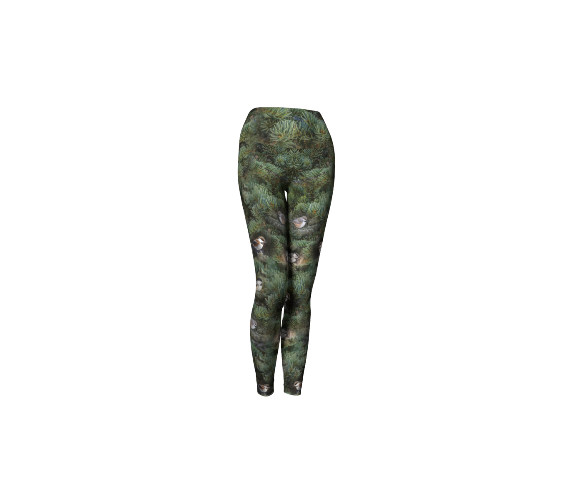 This is a front profile of a pair of yoga leggings with a 4.5 inch high waist band. They have a green background of pine branches and a collage of four different chickadees.