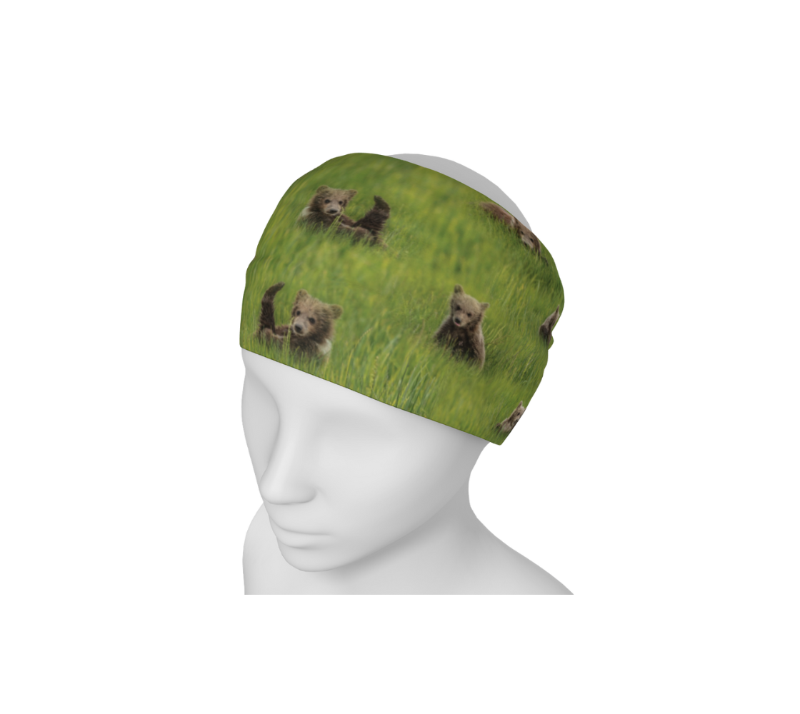 A brown bear cubs head and neck buff from our wildlife photography on a mannequin head as a head band.