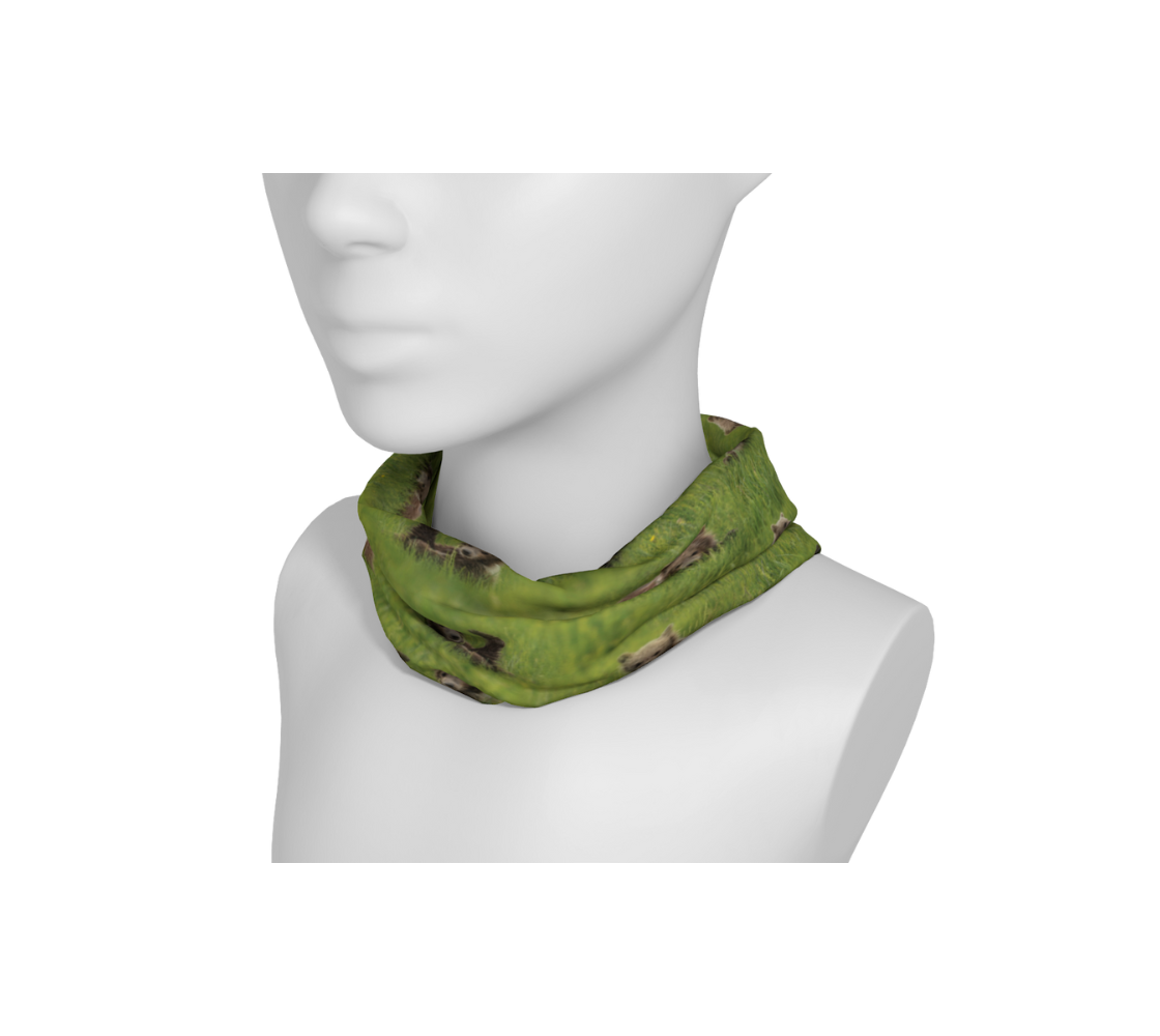 A brown bear cubs head and neck buff from our real wildlife photography wrapped around a mannequin's neck.