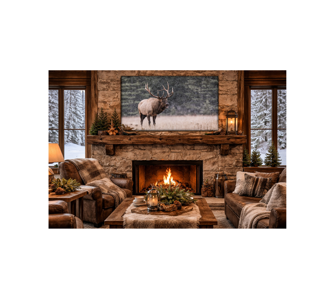 Cozy living room with fireplace, couches and a bull elk canvas print over the fireplace.