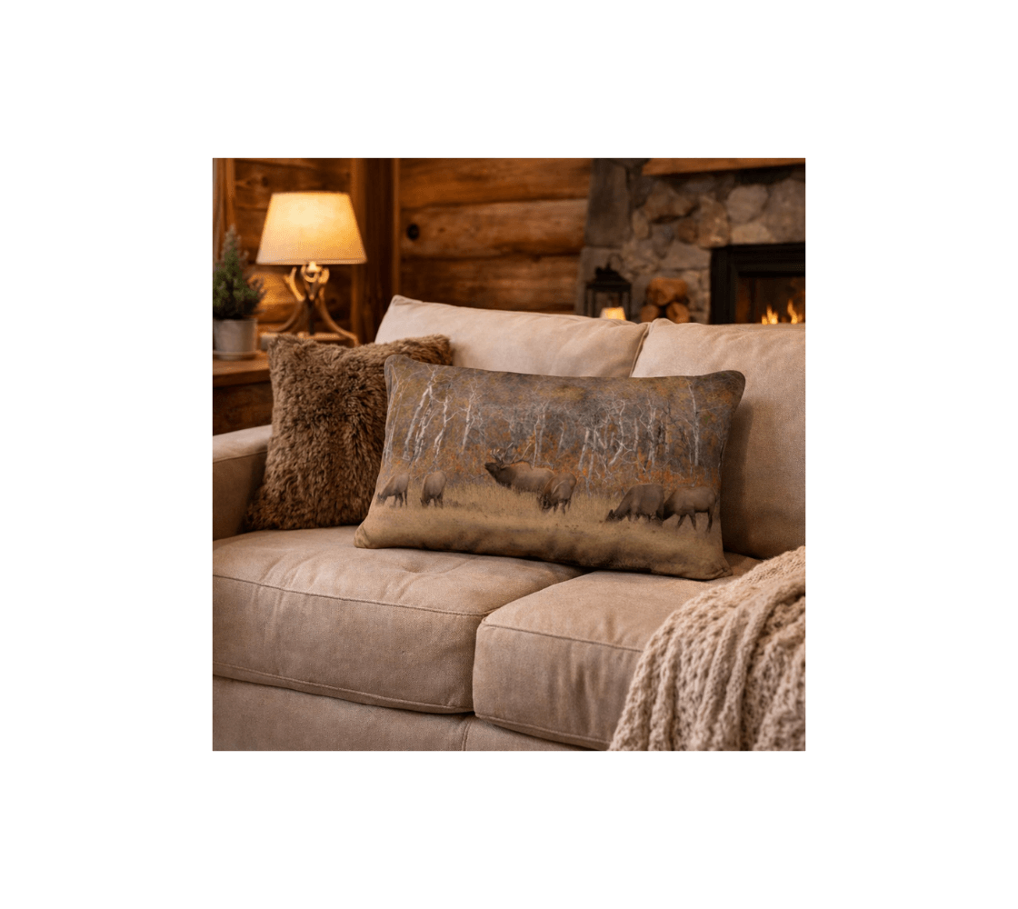 A cozy living room with a bull elk decorative long throw pillow cover from our wildlife photography on a beige sofa.