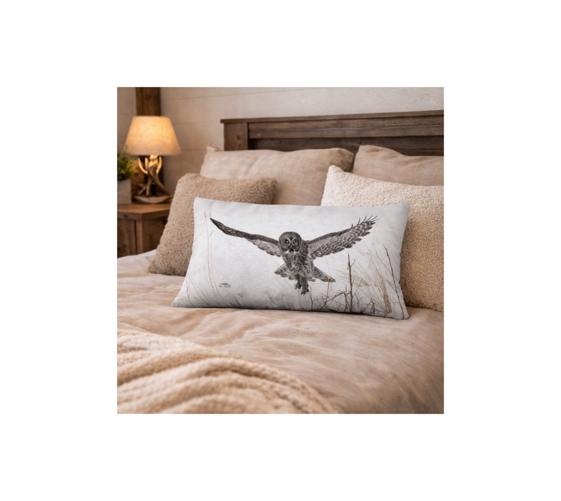 A bed room with a great gray owl  decorative long throw pillow cover from our real wildlife photography on a bed.