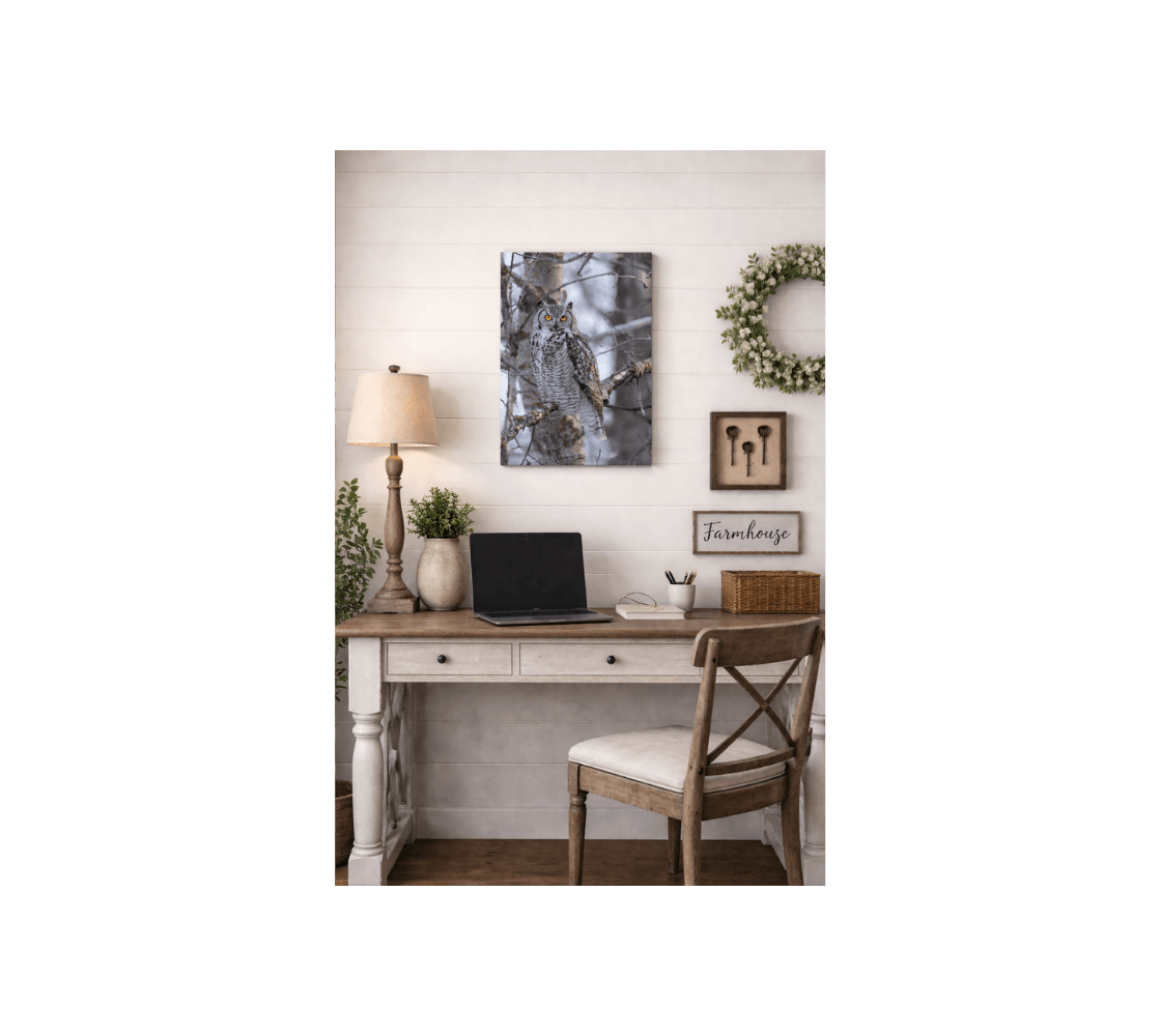 Home office with a great horned owl canvas from our real wildlife photography handing on a white wall above the desk.