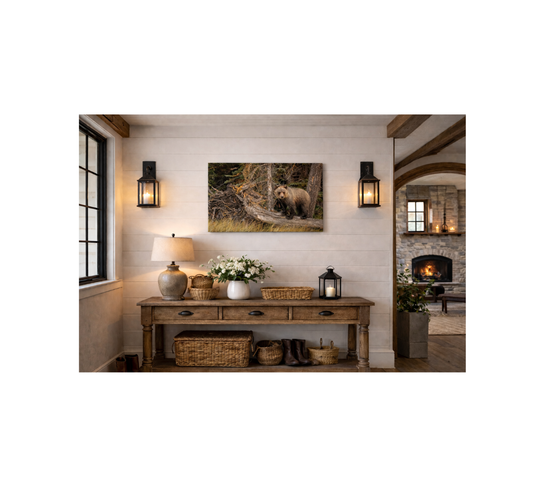Hallway with sideboard table with a canvas print of grizzly bear cub hanging on the wall.