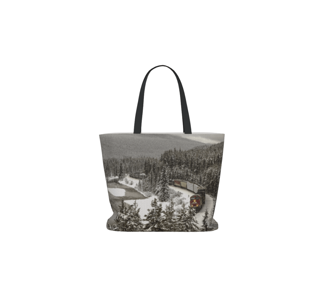 A large tote bag with a train in the rockie mountains from our real nature photography.