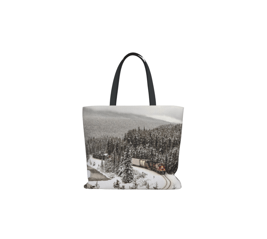 A large tote bag with a train in the rockie mountains from our real nature photography.