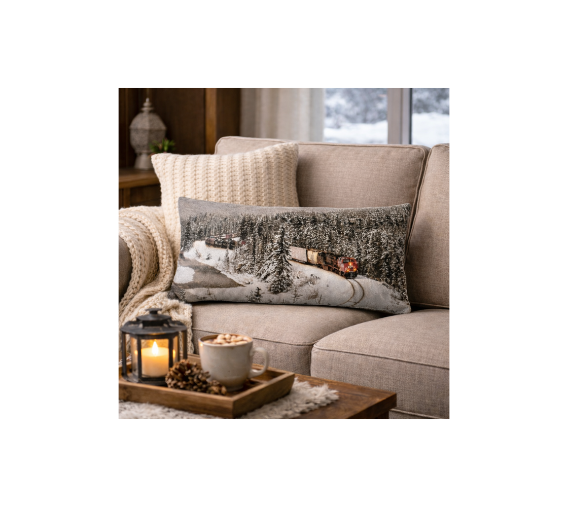 A long cushion of train at Morant's Crave on a beige sofa.