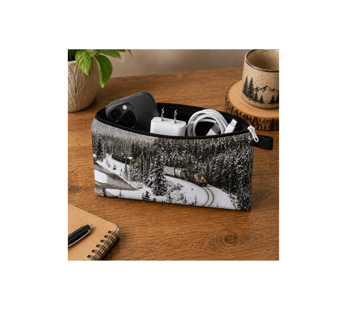 A zippered pouch with at train Morant' Curve from our real nature photography holding a smartphone, white charger and cable. 