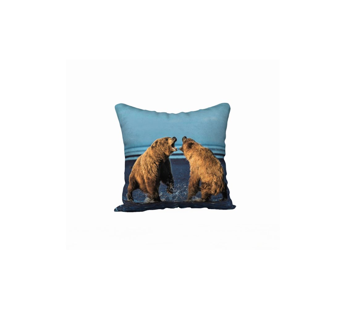 This 18 x 18 inch plush velveteen cushion cover features two female Alaskan brown bears squatted down roaring at each other. The cushion cover background is blue sky, lines of blue ocean out running cross and dark blue sand.