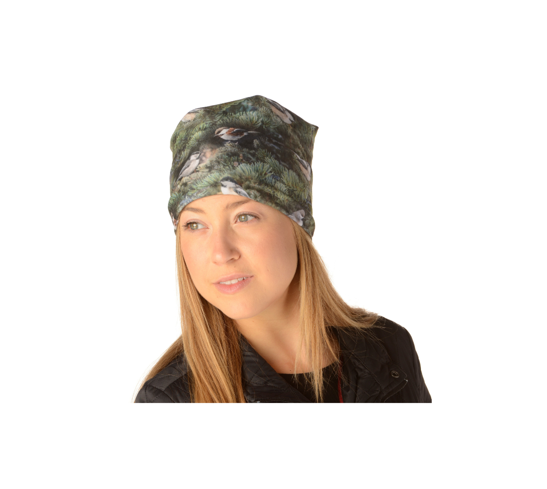 This Canadian-made lightweight beanie features a wildlife photographed images of  four different chickadees. The soft bamboo lining is a moisture wicking fabric so you don’t sweat or itch in them. Comes in youth & adult sizes. 