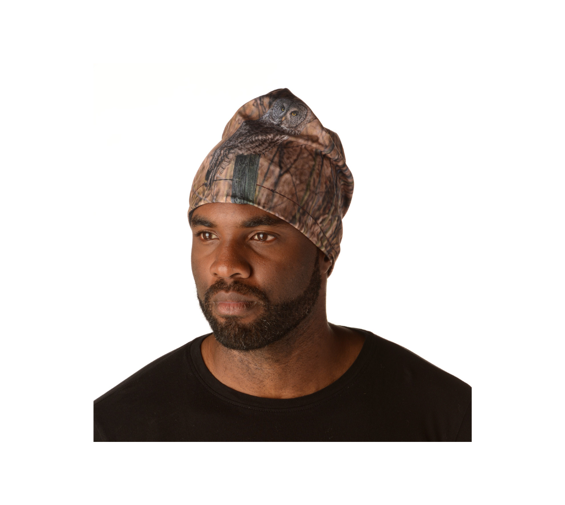 This Canadian-made lightweight beanie features a wildlife photographed image of  a great grey owl. The soft bamboo lining is a moisture wicking fabric so you don’t sweat or itch in them. Comes in youth & adult sizes. 