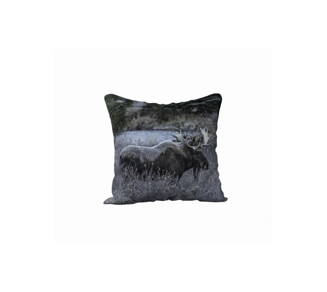 A Canadian-made soft plush velveteen cushion cover featuring a real North American wildlife image of a bull moose. Solid black velveteen on the reverse side with a durable hidden zipper. Measures 18” x 18”.