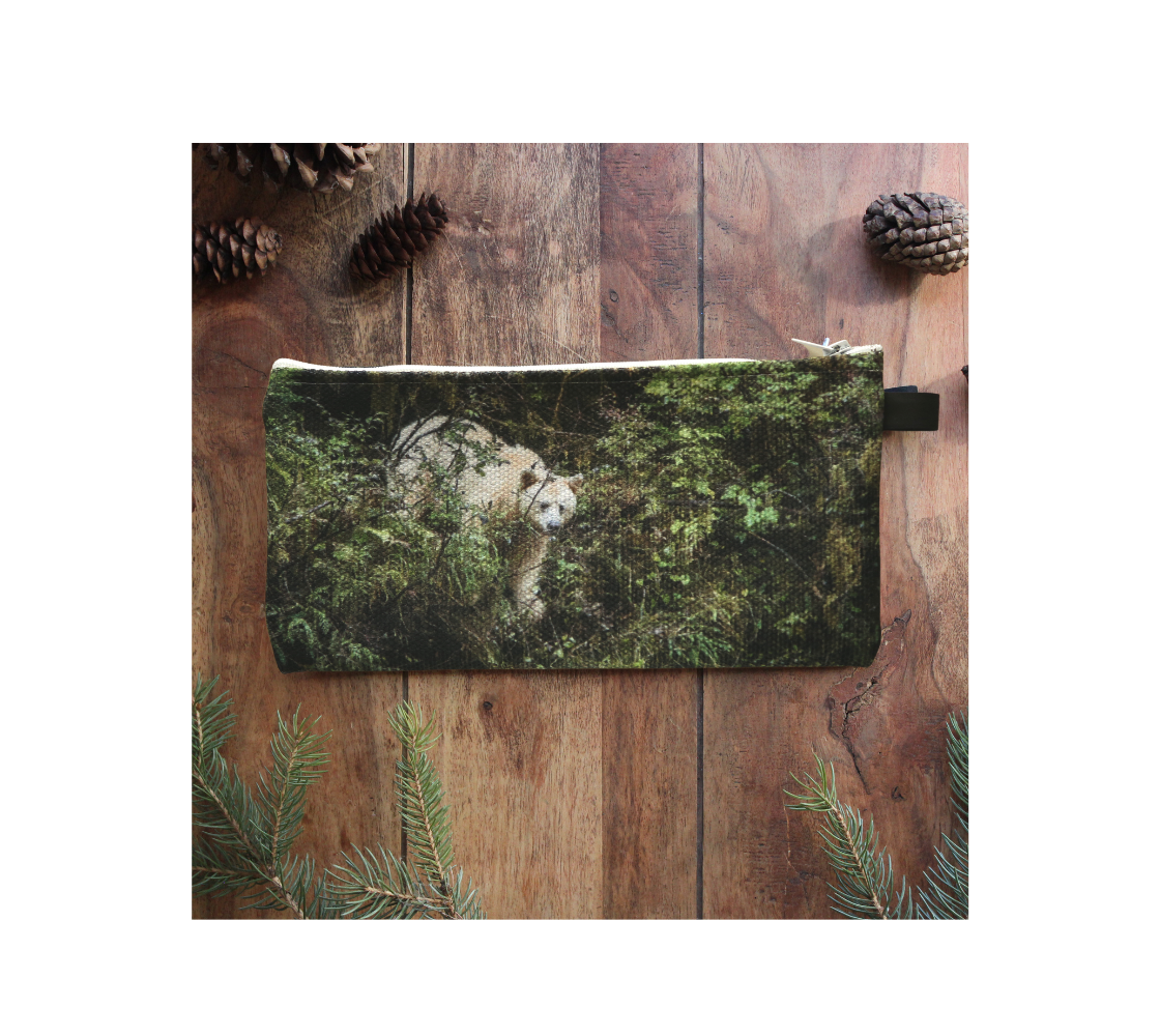 Durable double sided 9” x 4” canvas zippered pouch featuring real images of spirit bear coming down to river.
