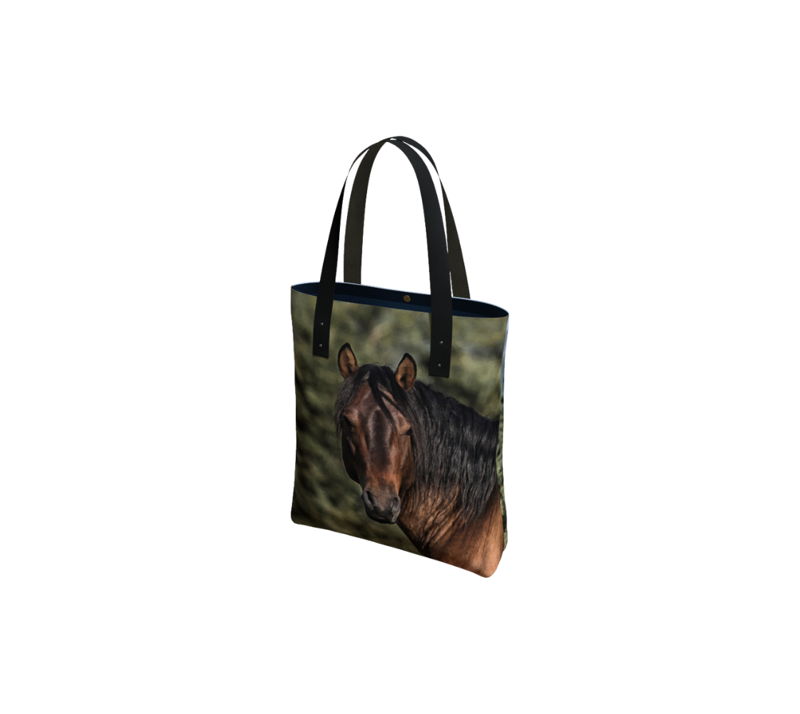Durable canvas handbag with 1” vegan leather straps and magnetic closure with inside pockets. Features double sided real images of Wild horses of Alberta foothills Measures 16” x 13” x 3”.