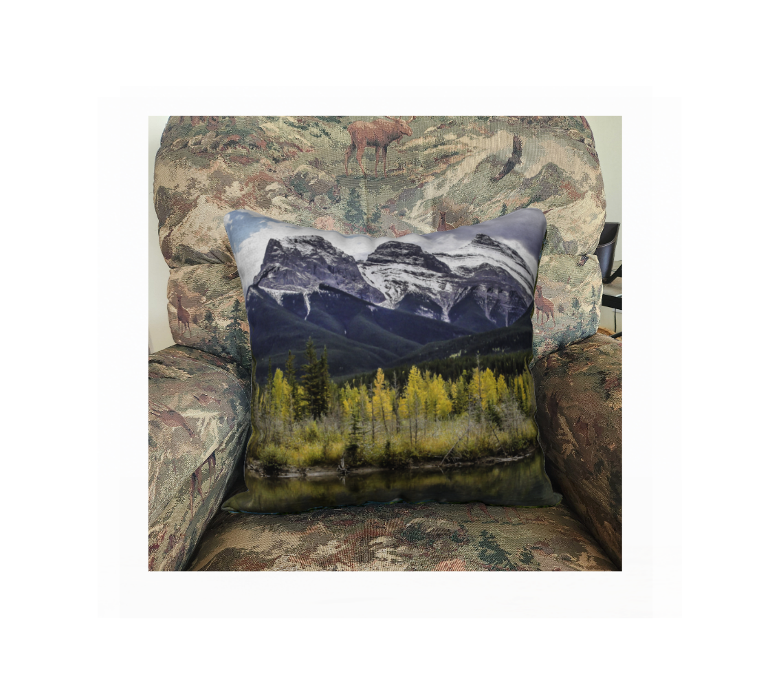 A Canadian-made soft plush velveteen cushion cover featuring a real North American wildlife image of a mountain scene. Solid black velveteen on the reverse side with a durable hidden zipper. Measures 18” x 18”.